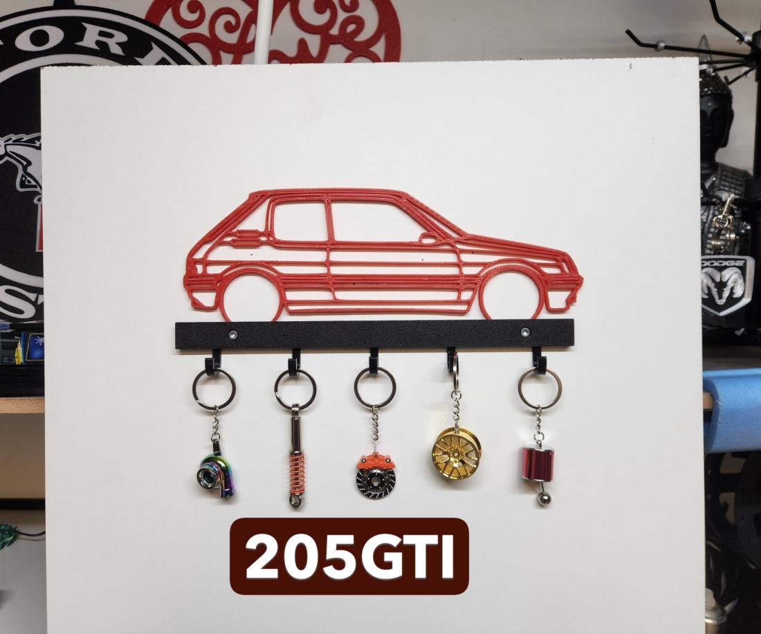 Support pour clé , ou autre 205GTI