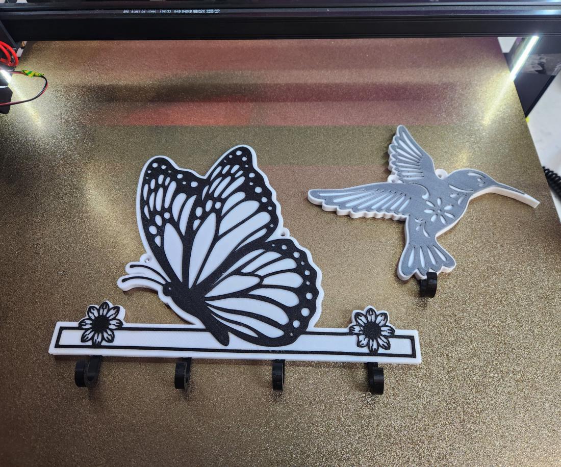 Support pour clé , torchons ou autre Papillon